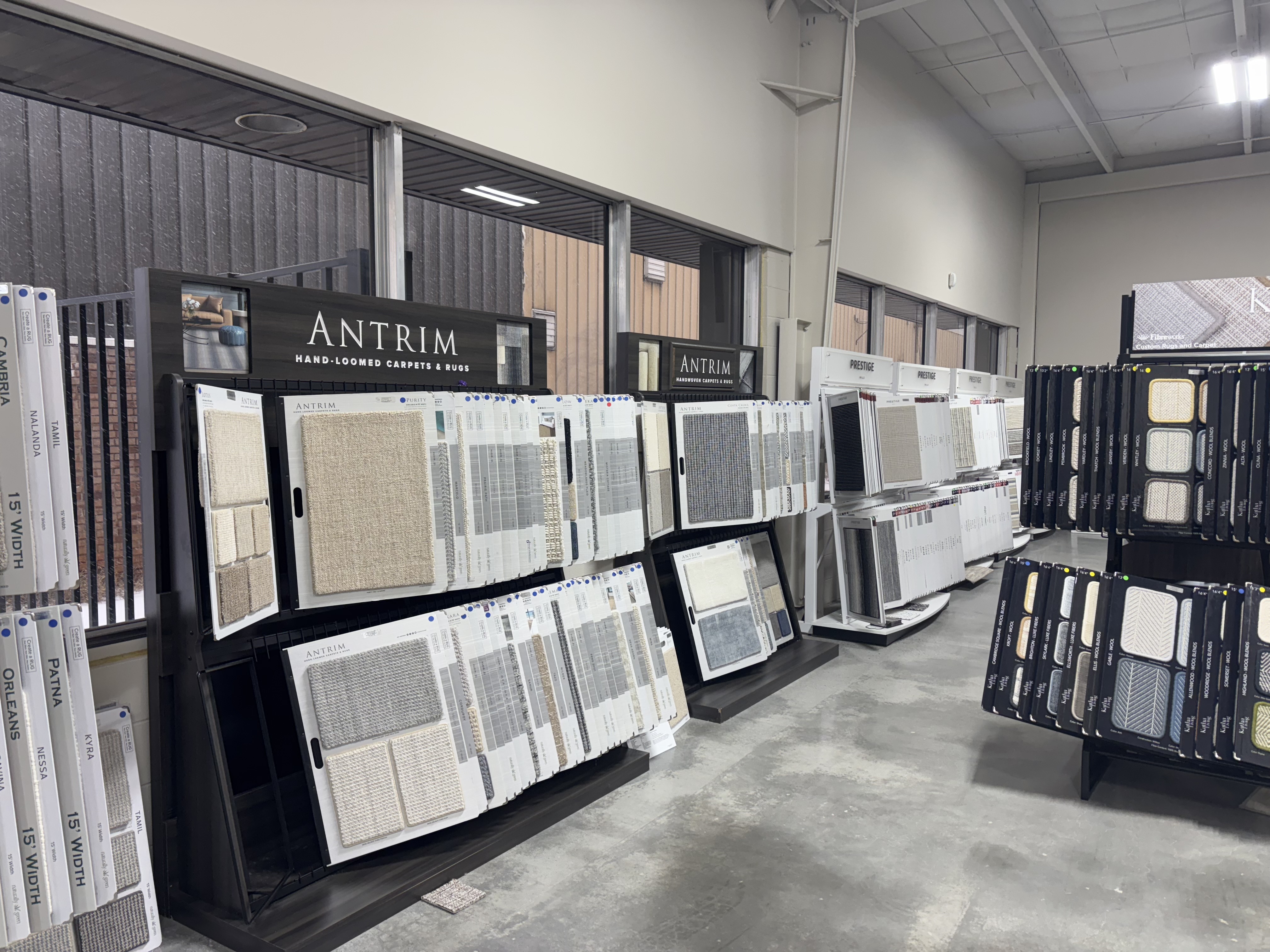 Underfoot Design flooring showroom in Tucker GA with stair runner and carpet samples