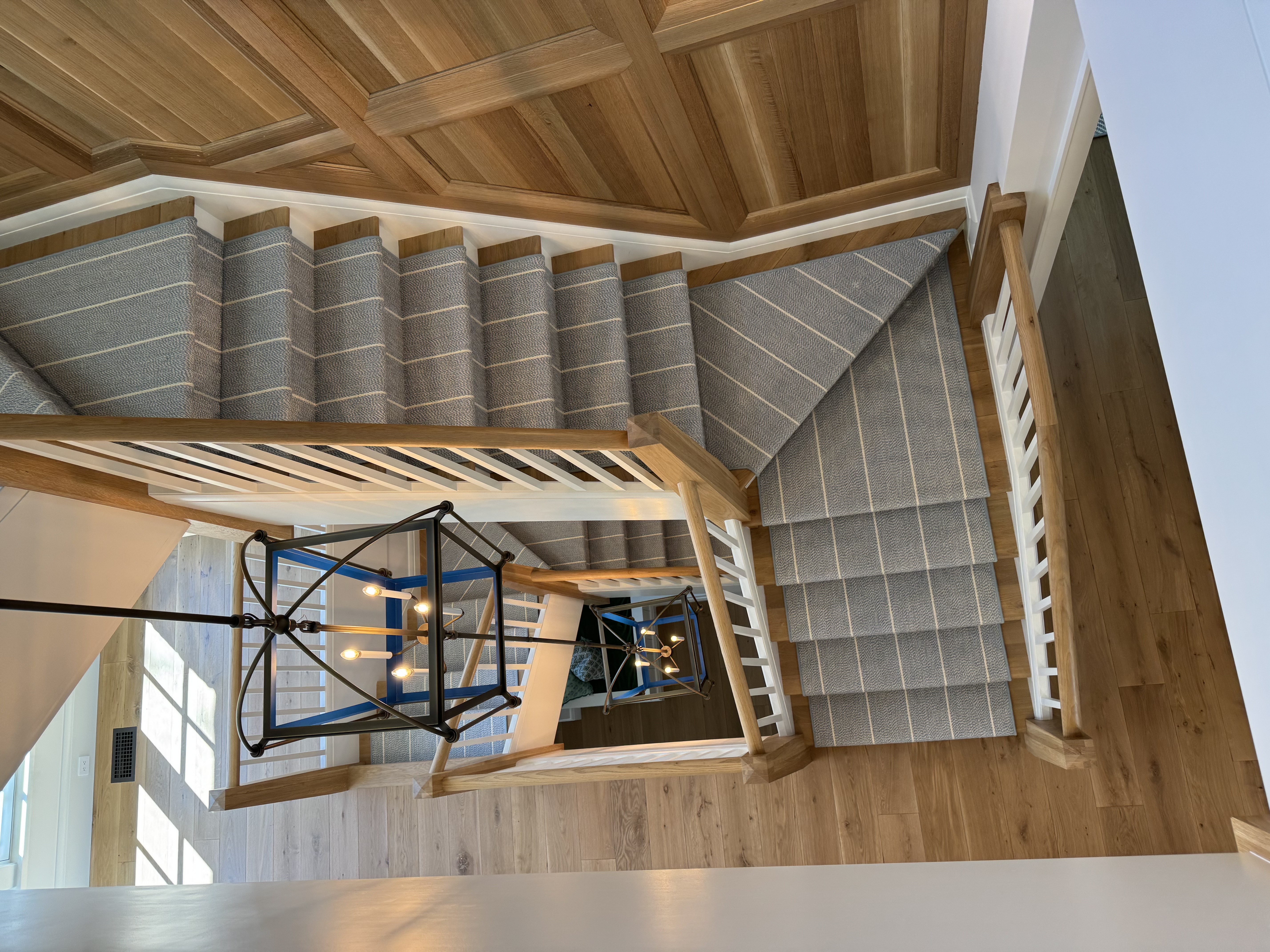 Hand-finished custom stair runner and hallway runner installation by Underfoot Design Atlanta
